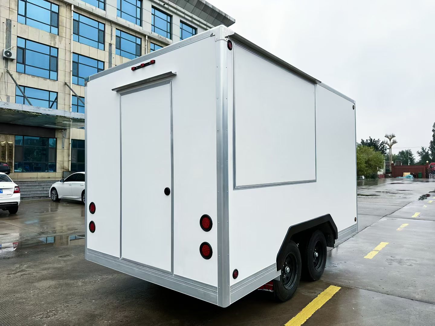 Cabin house with trailer and food trailer